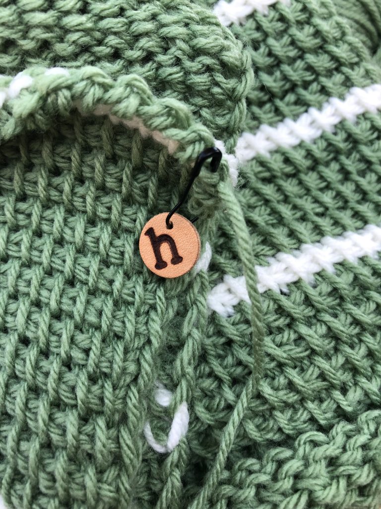 single leather stitch marker in use